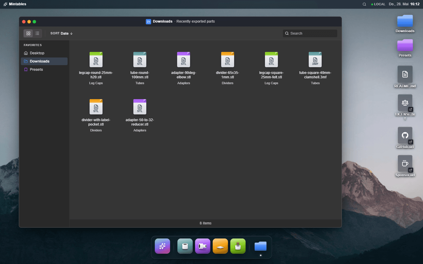 A Finder-style window titled 'Downloads' shows a grid of file tiles. Each tile is color-coded by the generator that produced it: tubes are blue-green, adapters are purple, dividers are amber, leg caps are lime. A sidebar on the left lists Favorites: Desktop, Downloads, Presets. A status bar at the bottom shows the item count.